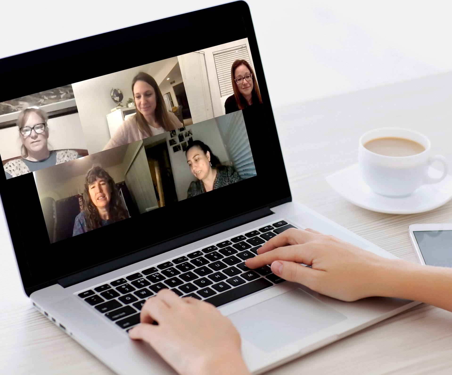 Female hands typing on a laptop keyboard with isolated screen in
